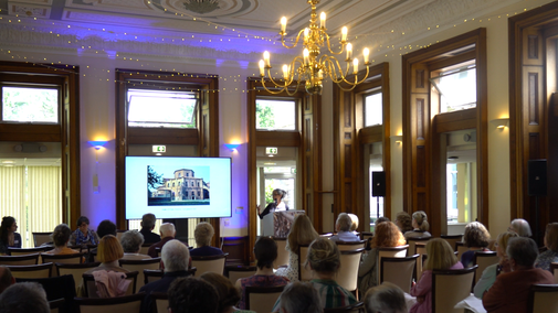 A crowd during one of the presentations at the Symposium. A la Ronde, Devon.